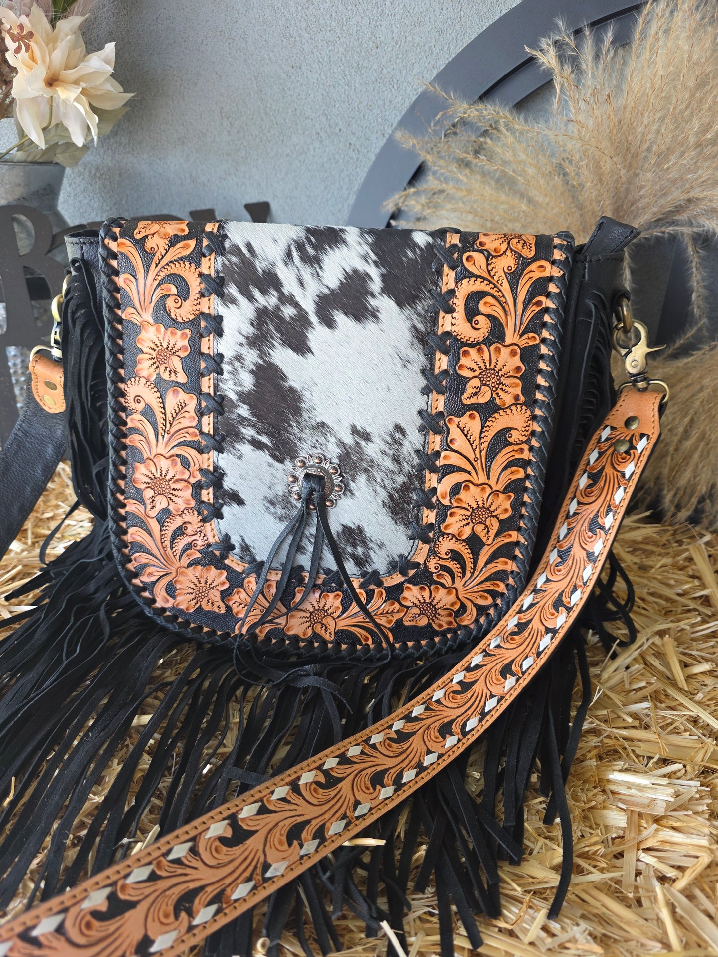 LEATHER AND COWHIDE MESSENGER BAG