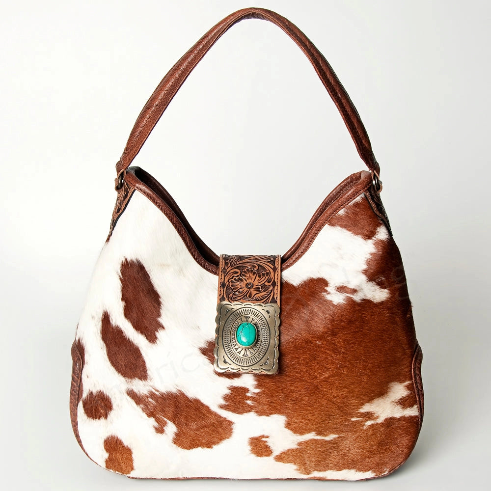 Hair-On Cowhide Hobo Bag with Tooled Leather Strap & Turquoise Concho Accent -