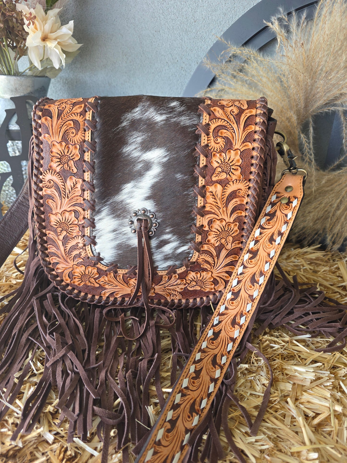 LEATHER AND COWHIDE MESSENGER BAG
