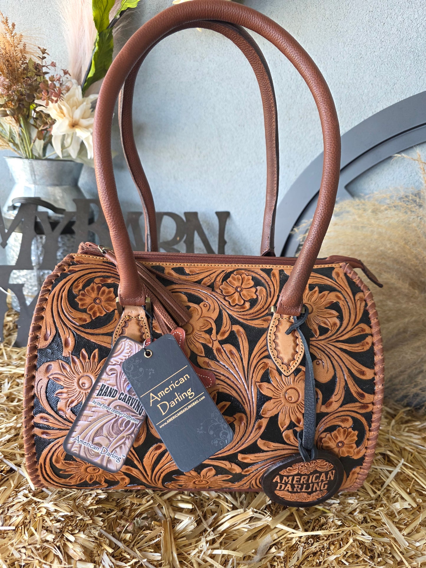 BLACK AND BROWN DUFFLE
