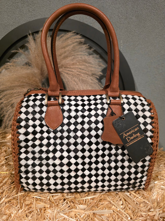 MEDIUM COWHIDE BLACK WHITE AND BROWN DUFFLE