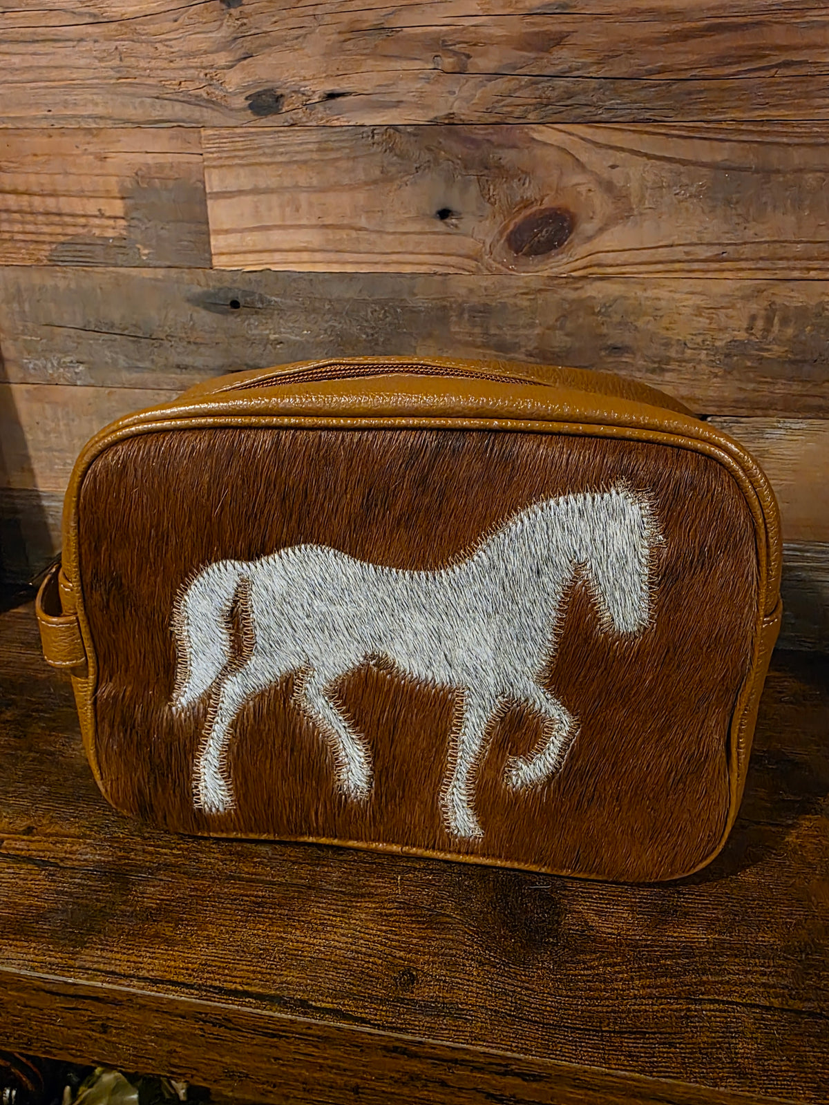 COWHIDE TOILETRY BAG