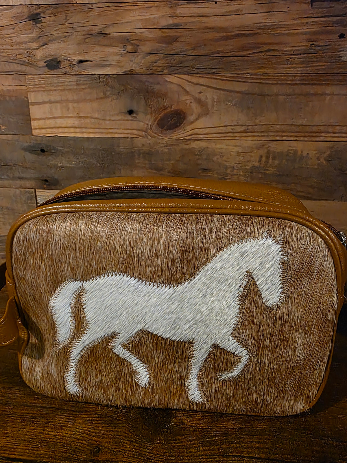 COWHIDE TOILETRY BAG