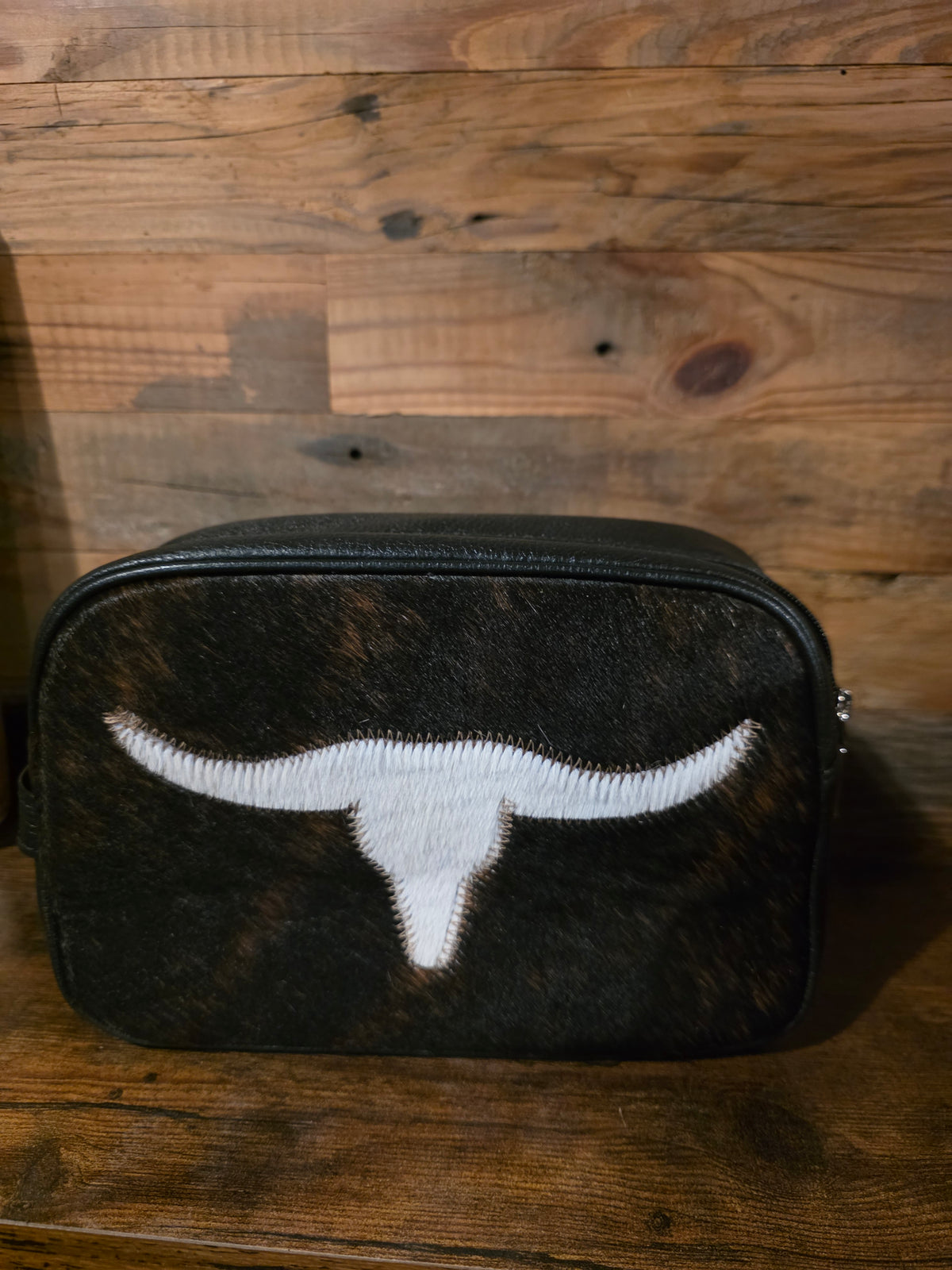 COWHIDE TOILETRY BAG