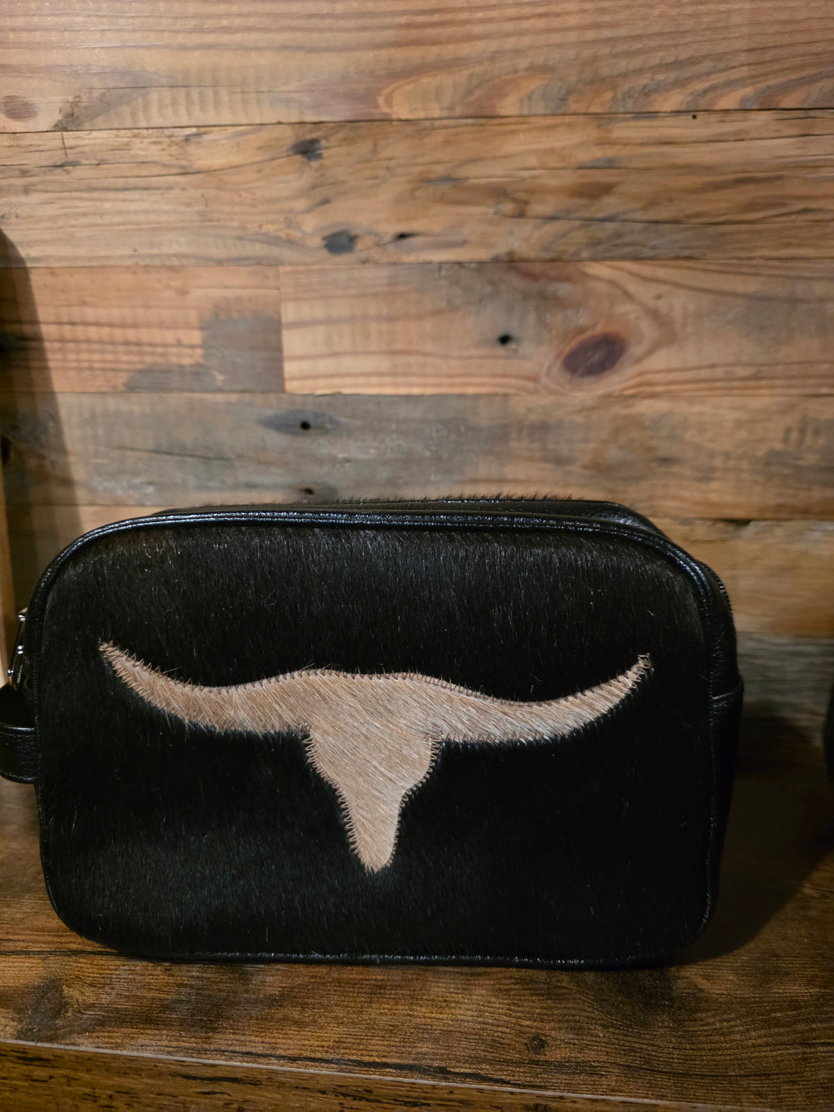 COWHIDE TOILETRY BAG