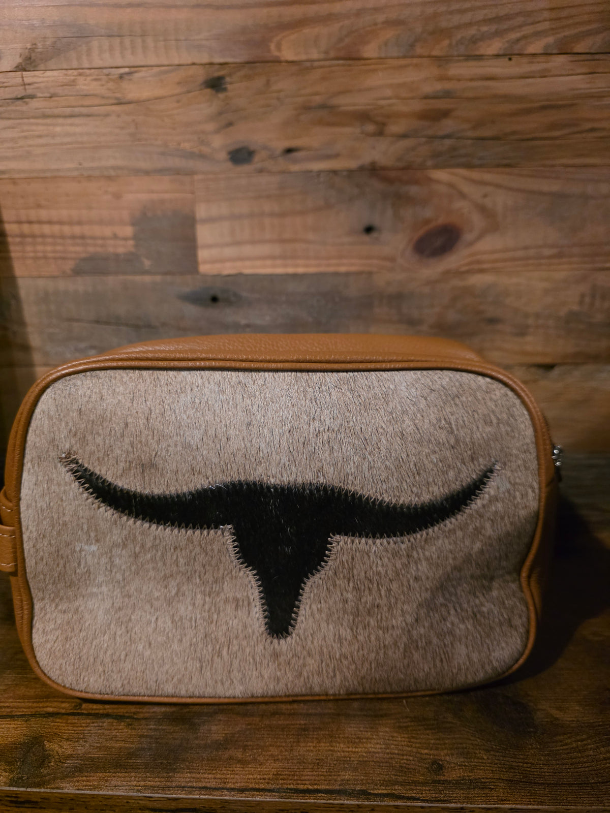 COWHIDE TOILETRY BAG