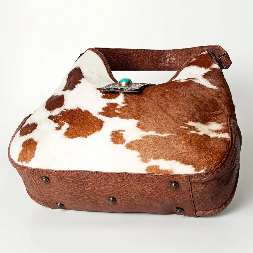 Hair-On Cowhide Hobo Bag with Tooled Leather Strap & Turquoise Concho Accent -