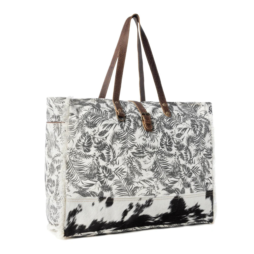 Wildfern Hide Western Weekender Bag for Women in ivory with hairon detail