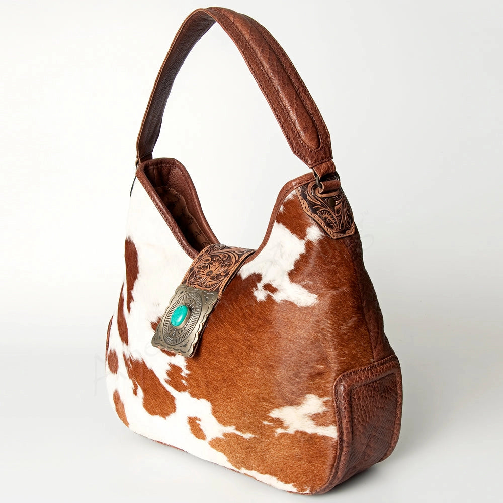 Hair-On Cowhide Hobo Bag with Tooled Leather Strap & Turquoise Concho Accent -